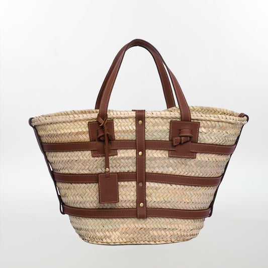 Classic Moroccan straw tote bag with leather trim, stitched handles, and a tag charm