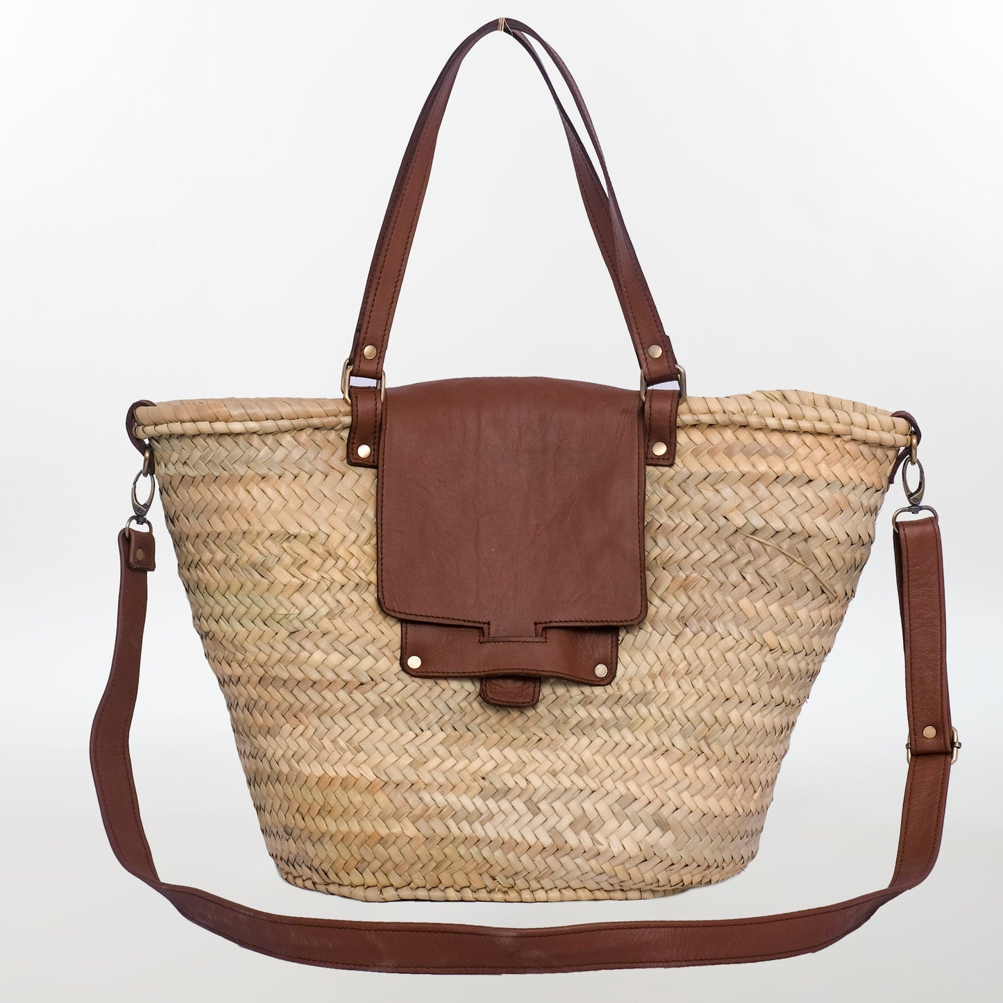 Moroccan straw tote with wide leather flap and detachable crossbody strap