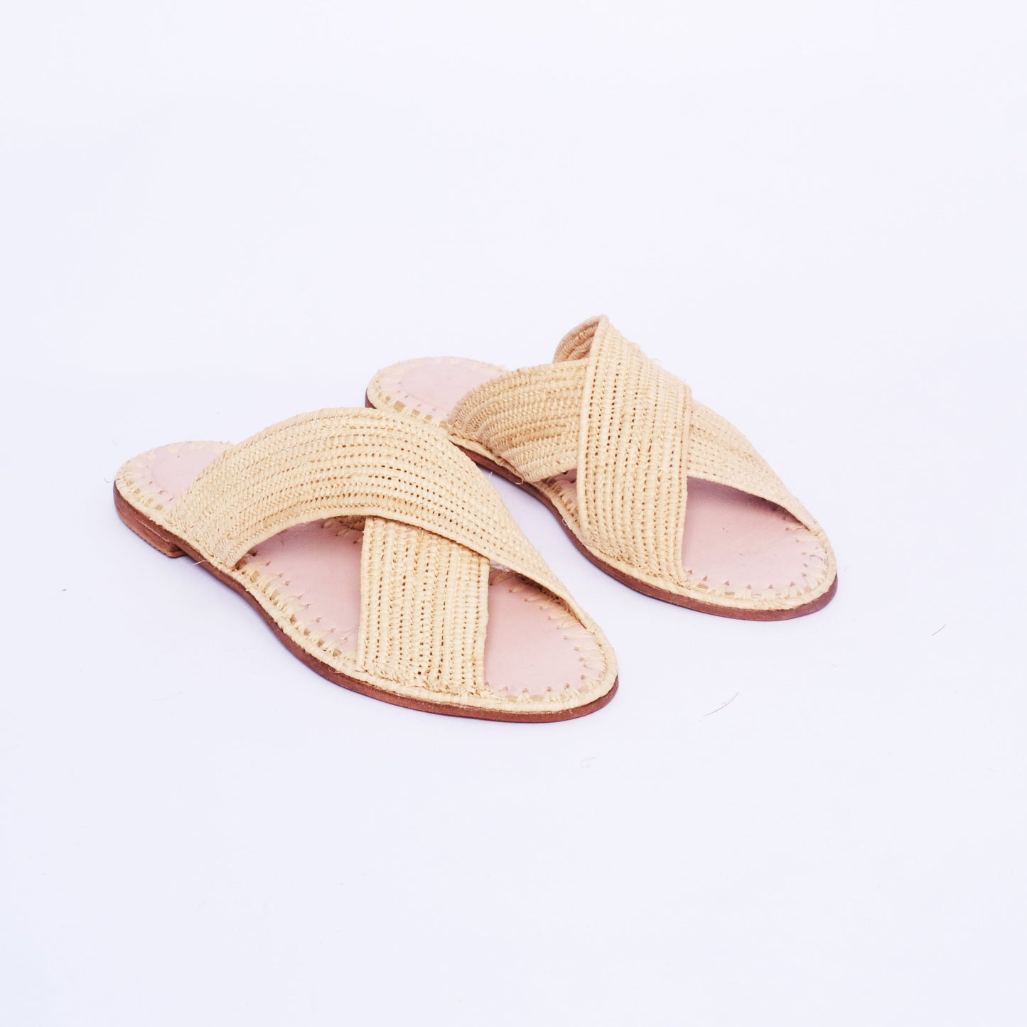 Flat natural raffia sandals with crossover straps handmade in Morocco