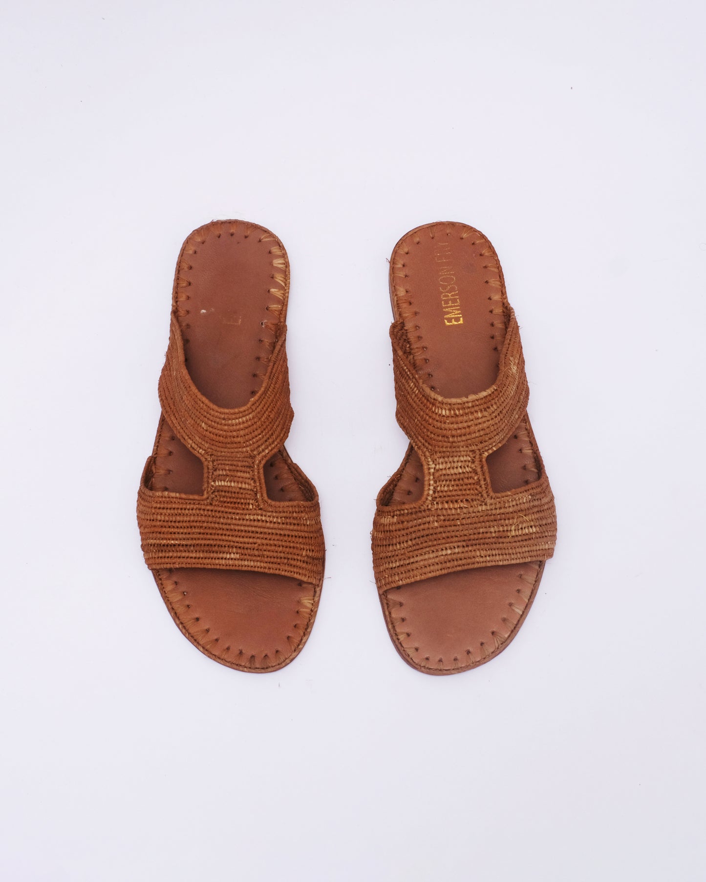 Handmade brown raffia slide sandals with open toe and leather sole, made in Morocco