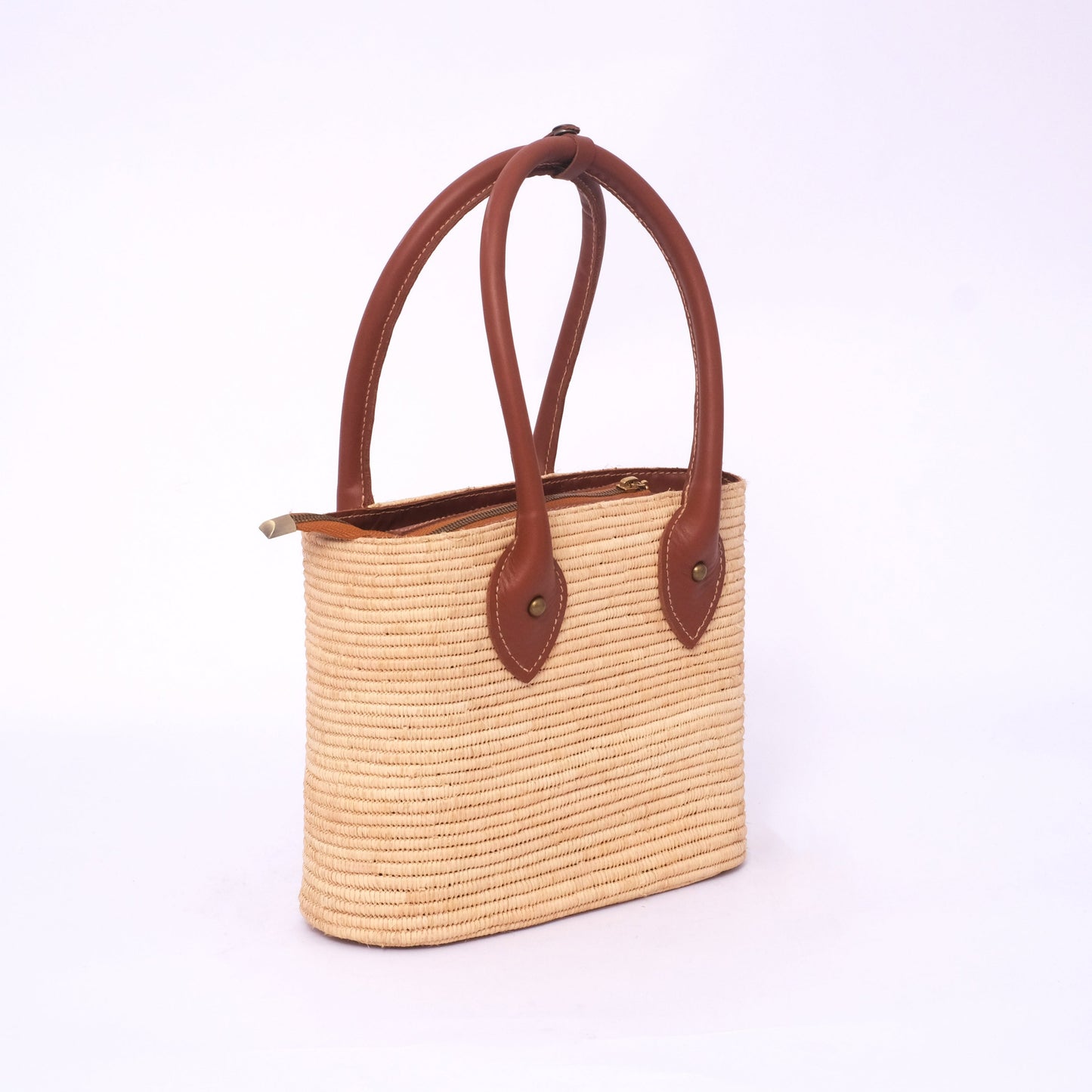 Embrace Sustainable Elegance with the Handwoven Raffia & Vegan Leather Bag