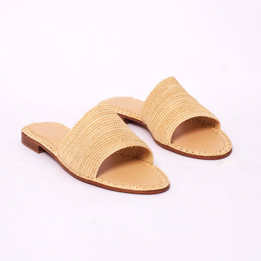 Natural raffia slide sandals with minimalist design and leather sole, handcrafted in Morocco