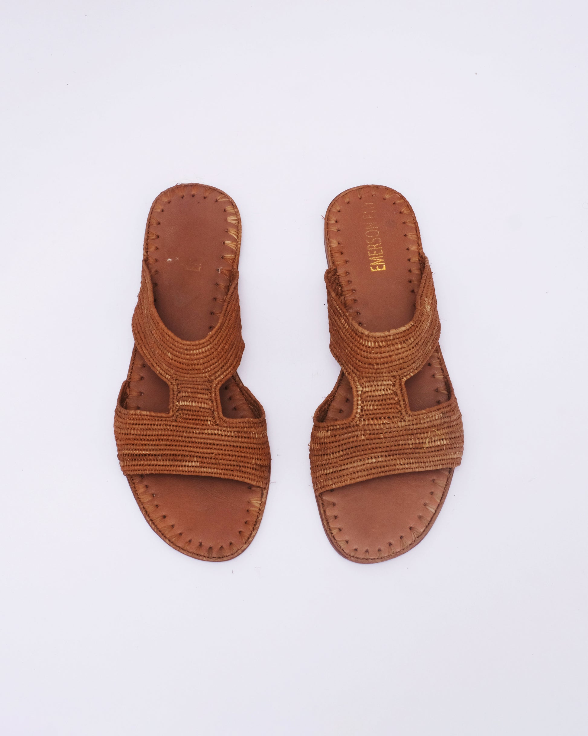 Handmade brown raffia slide sandals with open toe and leather sole, made in Morocco