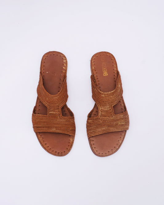 Handmade brown raffia slide sandals with open toe and leather sole, made in Morocco